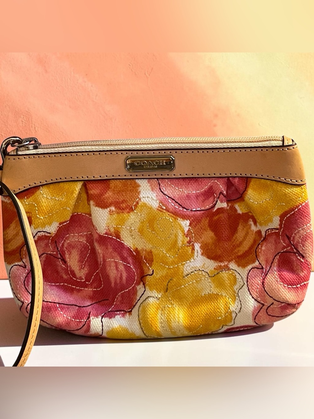 Excellent condition Coach with beautiful floral pattern